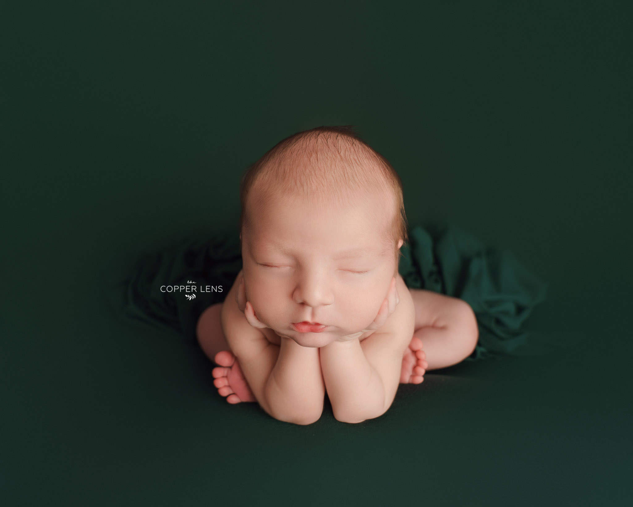 baby girl during newborn photoshoot in swansea