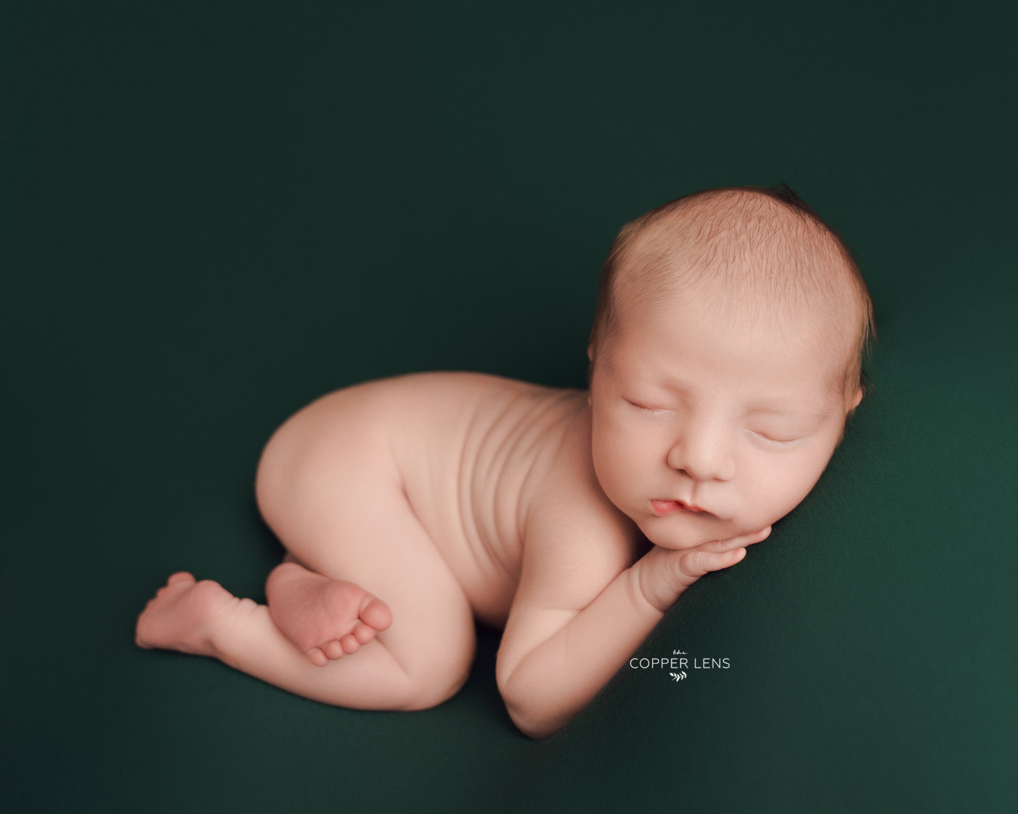 sleeping newborn baby at Swansea newborn photoshoot