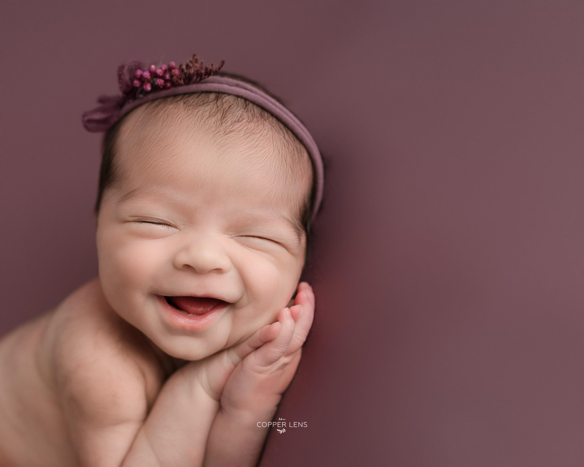 baby girl during newborn photoshoot in swansea