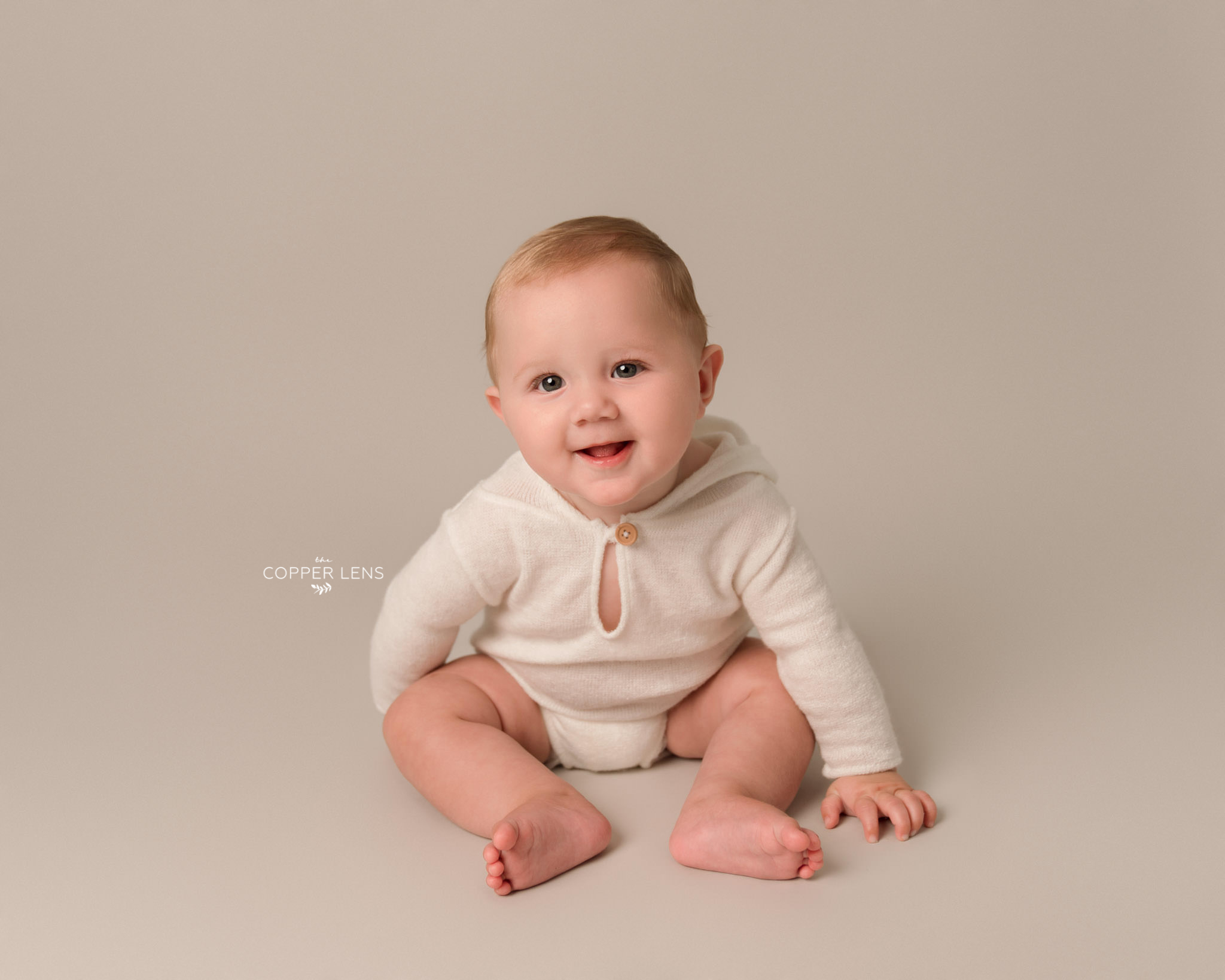 baby boy smiling during photoshoot swansea
